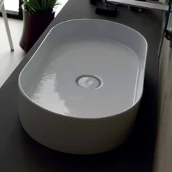 Viadurini Bathroom Farbige Waschbecken-Aufsatzwaschbecken aus Keramik in modernem Design Sun, hergestellt in Italien, 65 x 35 cm